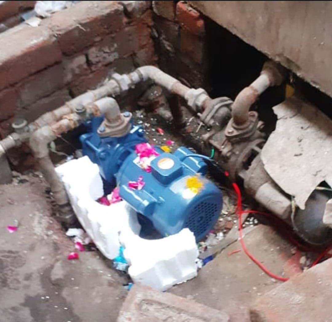 The water pump we gifted to Indira Gandhi Camp in Kasturba Nagar, bringing water door to door for around 3,000 people.